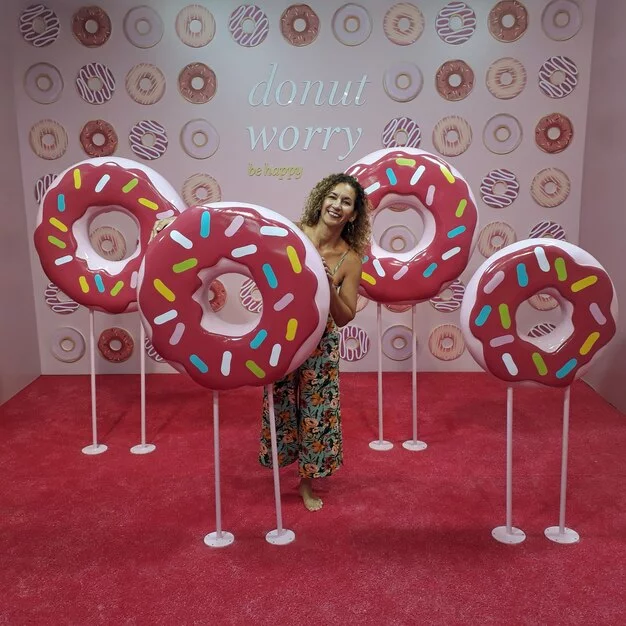 A festive stand featuring limited-edition donuts inspired by popular music events.